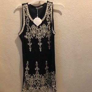 Cream and black tank top blouse